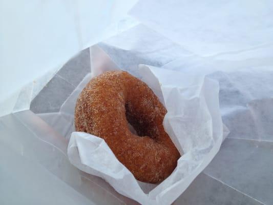 Pumpkin donut with cinnamon sugar.  Soft and fluffy and delicious.