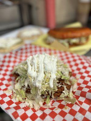 Tostada de tinga (shredded chicken with chipotle marinate tostada)