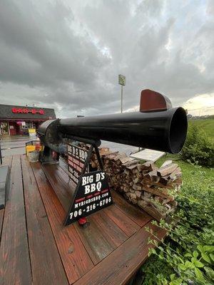 You know your BBQ will be bangin when it comes out of a revolver-shaped smoker