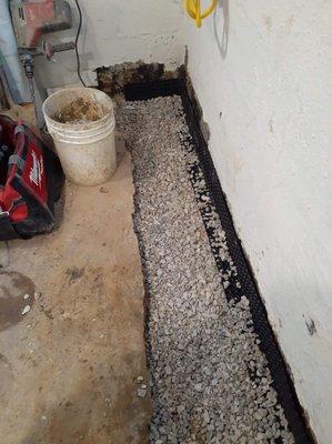 Gravel on top of Drain tile system before laying concrete