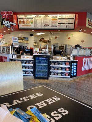 Front counter and menu board where I noticed the freebies after I'd already ordered.