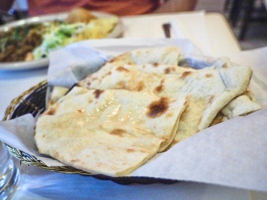 Naan : buttery and lite. Perfect to dip in the Bhuna Goat