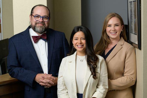 (L to R): Attorney John, Paralegal Karla, and Attorney Brooks