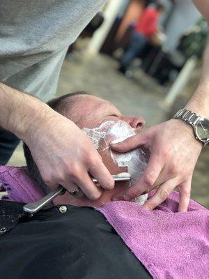 Our signature service, the traditional straight edge razor hot towel shave using steamers and hot towels.