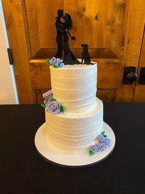 Vegan wedding cake with topper