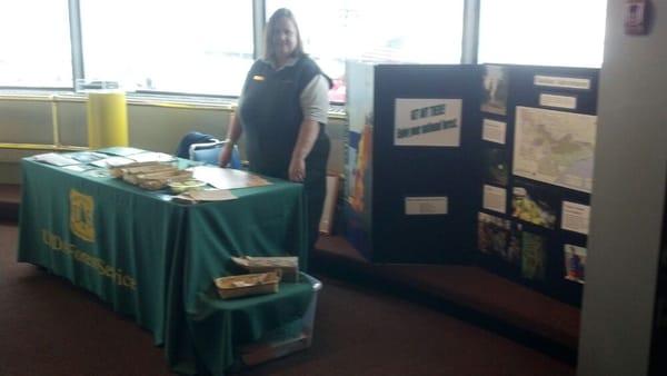 Sandy staffing the Superior National Forest booth for the Earth Day Event.