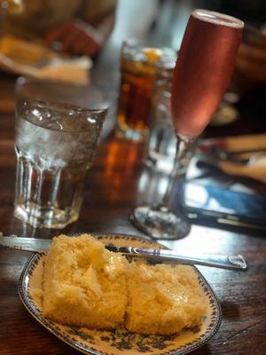 Warm cornbread with butter and a cranberry mimosa to start off brunch on the right foot.