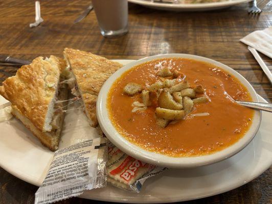 Half sandwich/ soup special: chicken, bacon, ranch, & a bowl of their famous tomato basil soup. Fresh basil grown inside the restaurant!!