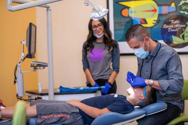 Dr. Matthew Dunn with a patient.