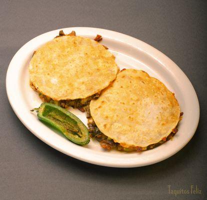 Mulitas - Corn Tortillas stuffed with cheese and your choice of meat.