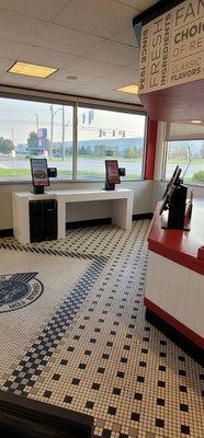 Self-serve kiosks order kiosks cash and credit taken if you struggle they will come and help you.