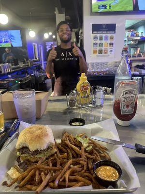 All American burger, chef in background