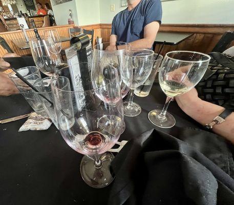 Glasses that were never cleared throughout meal