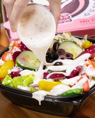 Fresh, crisp, and bursting with flavor - Hungry Howie's salad is the perfect healthy choice for a delicious meal!  #FreshEats #HealthyCh