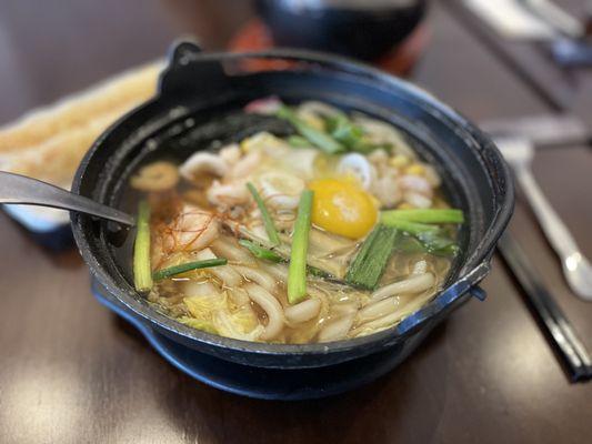 I enjoyed Nabeyaki-Udon with Seafood except frozen mussels. The broth is not perfect.