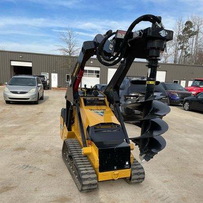 Mini skid steer with auger