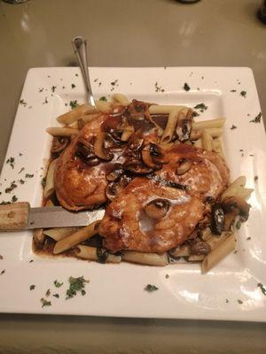 Chicken Marsala over penne pasta.