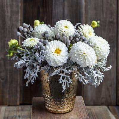 Mono botanical. One flower (in this case- dahlia) accented by seasonal foliage.