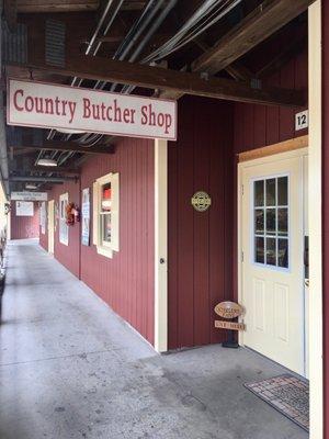 Outside of the butcher shop -- signage