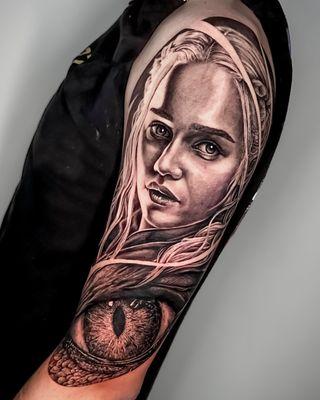 Daenerys Targaryen, dragon eye. black and grey realism tattoo