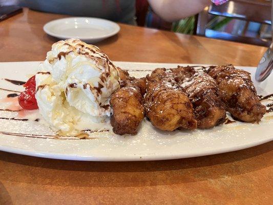 Fried Banana with Coconut Ice Cream ( honey drizzle on the ice cream )