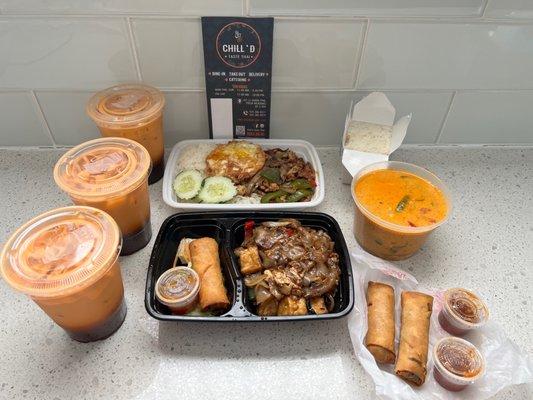 Thai Iced Tea; Ground chicken Garlic Sauce Over rice w/egg; Tofu Drunken Noodles w/spring roll; Red Curry Chicken w/spring roll