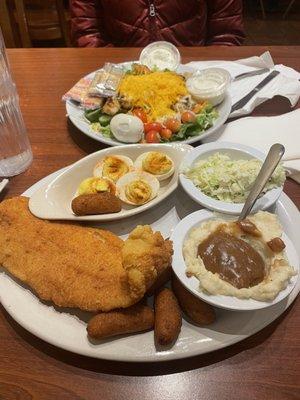 Salt and pepper catfish, deviled eggs, mashed potatoes, slow, hush puppies, and grilled chicken salad