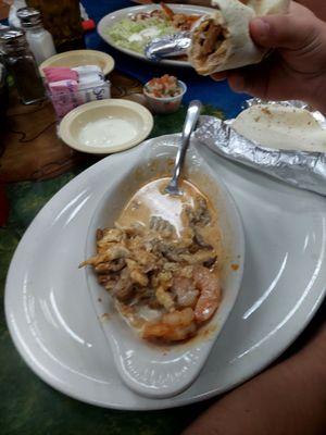 Ameca Dip- shrimp, steak and chicken - served with tortillas