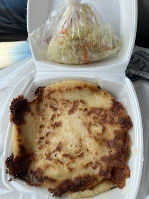 Pupusa with pickled coleslaw.