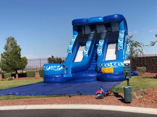 Slide from the skies, with our 20-Foot Double Splash Water Slide!