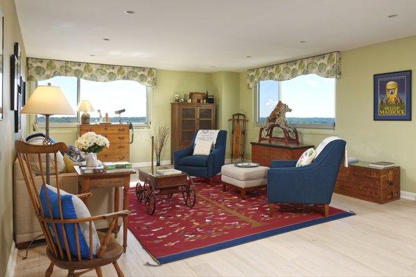 A condo living room's new paint color and valances add warmth and softness.