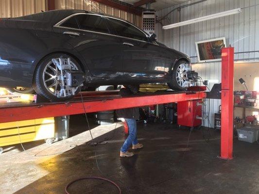 Our mechanic Jerry working on an alignment!