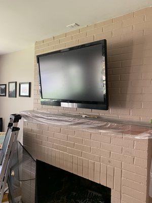 Customer install on a brick fireplace. Ceiling outlet or surface mount options are available.