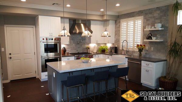 Complete kitchen remodeling, including new flooring, cabinets countertop and backsplash.