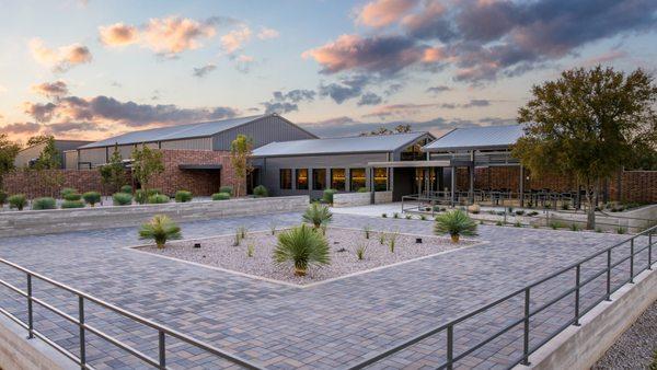 Tasting room and plaza overlooking the vineyards