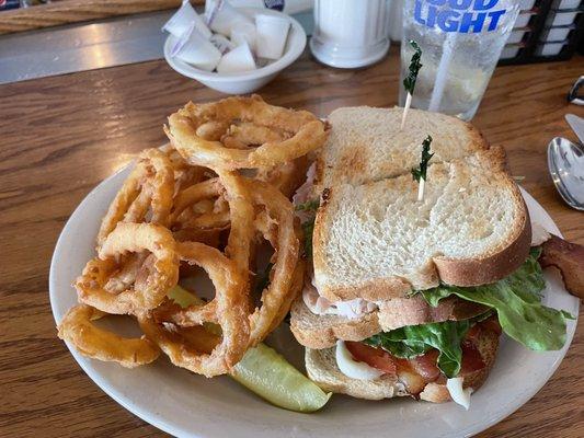 Classic Turkey club - real turkey, crisp bacon, just the right amount of Mayo. Oh, and the onion rings