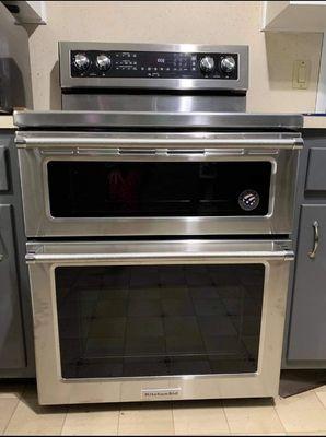 Checkout this beautiful kitchen aid, double oven glass top range we installed