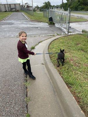 Child waking dog at OKCAW