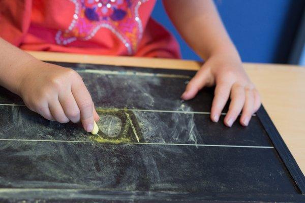 We use a multi-sensory kinesthetic approach to help children learn to write letters and numbers.