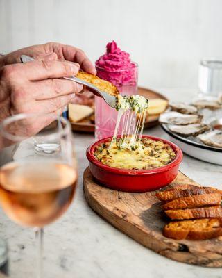 ARTICHOKE SPINACH DIP
Cheesy, decadent and simply irresistible, served with toasted crostinis