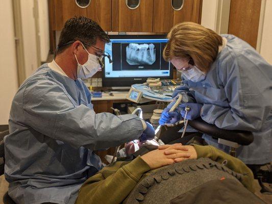 Dr Williams and Rhonda working on a friend.