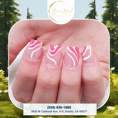 Candy-coated nails. 
* : https://lk.macmarketing.us/WendyNailsAndSpa-Booking