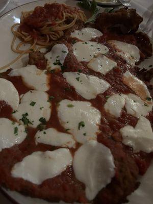 Butterflied veal chop parmigiana.  Pounded paper thin. OMG