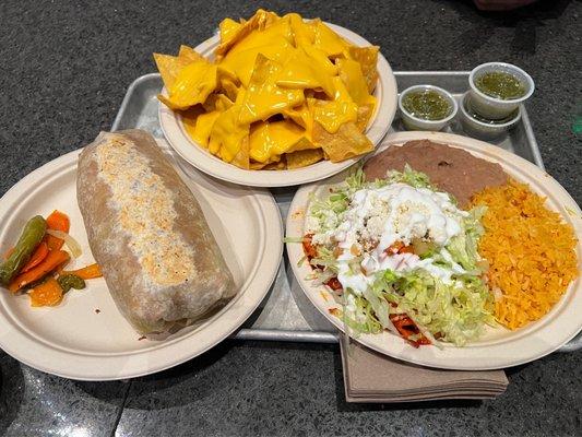 Chicken burrito,  chicken enchiladas and cheese nachos