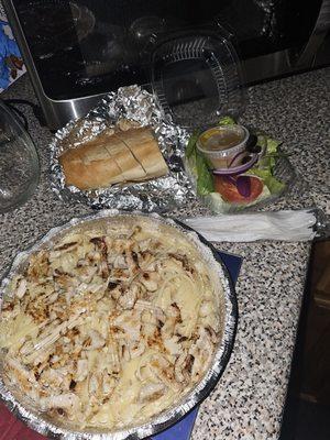 Grilled chicken alfredo comes with bread & a side salad