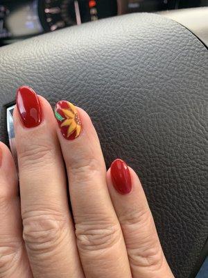 My first design - a simple sunflower on red - loved it!