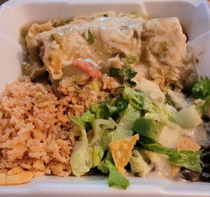 Green chilie burrito enchilada style combo with rice and black beans.