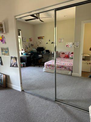 A clean mirrored closet here in Irvine.