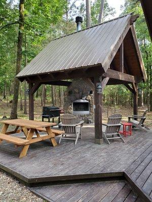 Back yard with outdoor fireplace