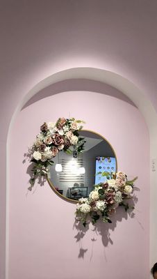 I love the floral mirror.